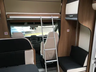 Motorhome with alcove - ladder to upper bed